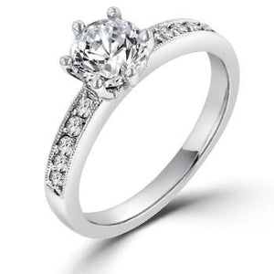 Round Diamond Solitaire Engagement Ring with Ten Diamond Eternity Shank - from Holsten Jewelers